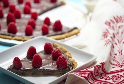 Chocolate cookie pizza with raspberries