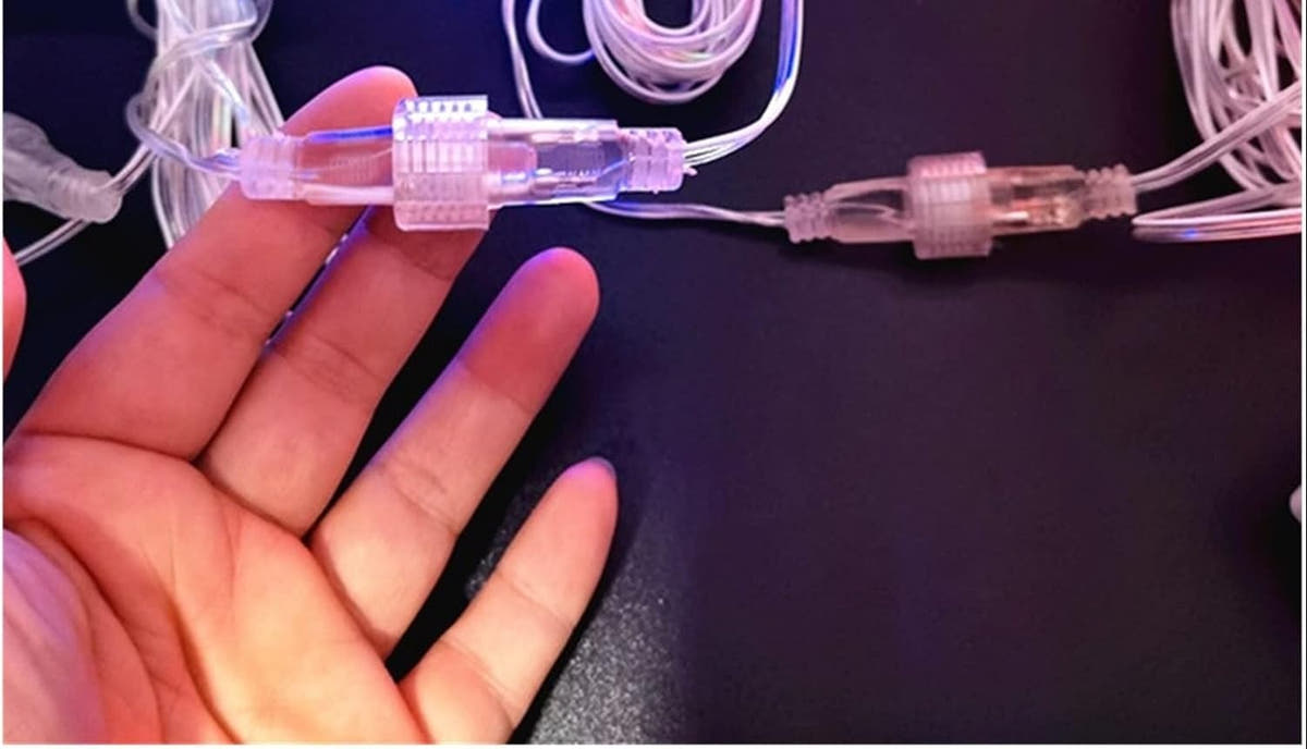 Waterproof connector linking two sets of falling rain lights